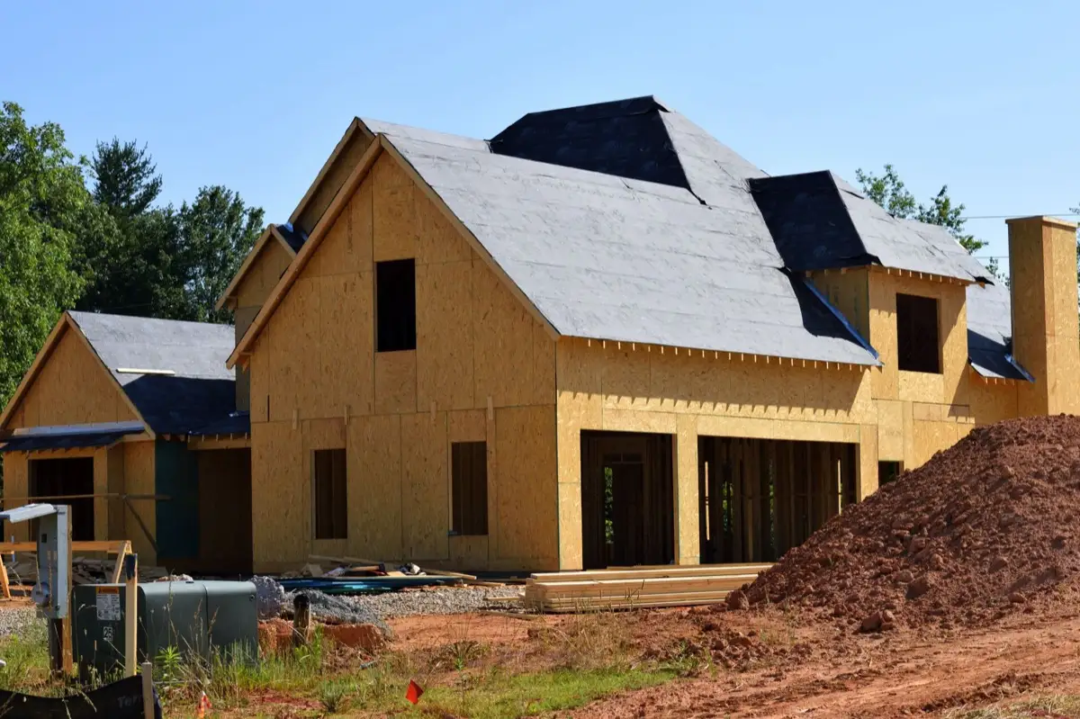 House with new roof decking and synthetic underlayment during a roof replacement in Tallahassee, FL