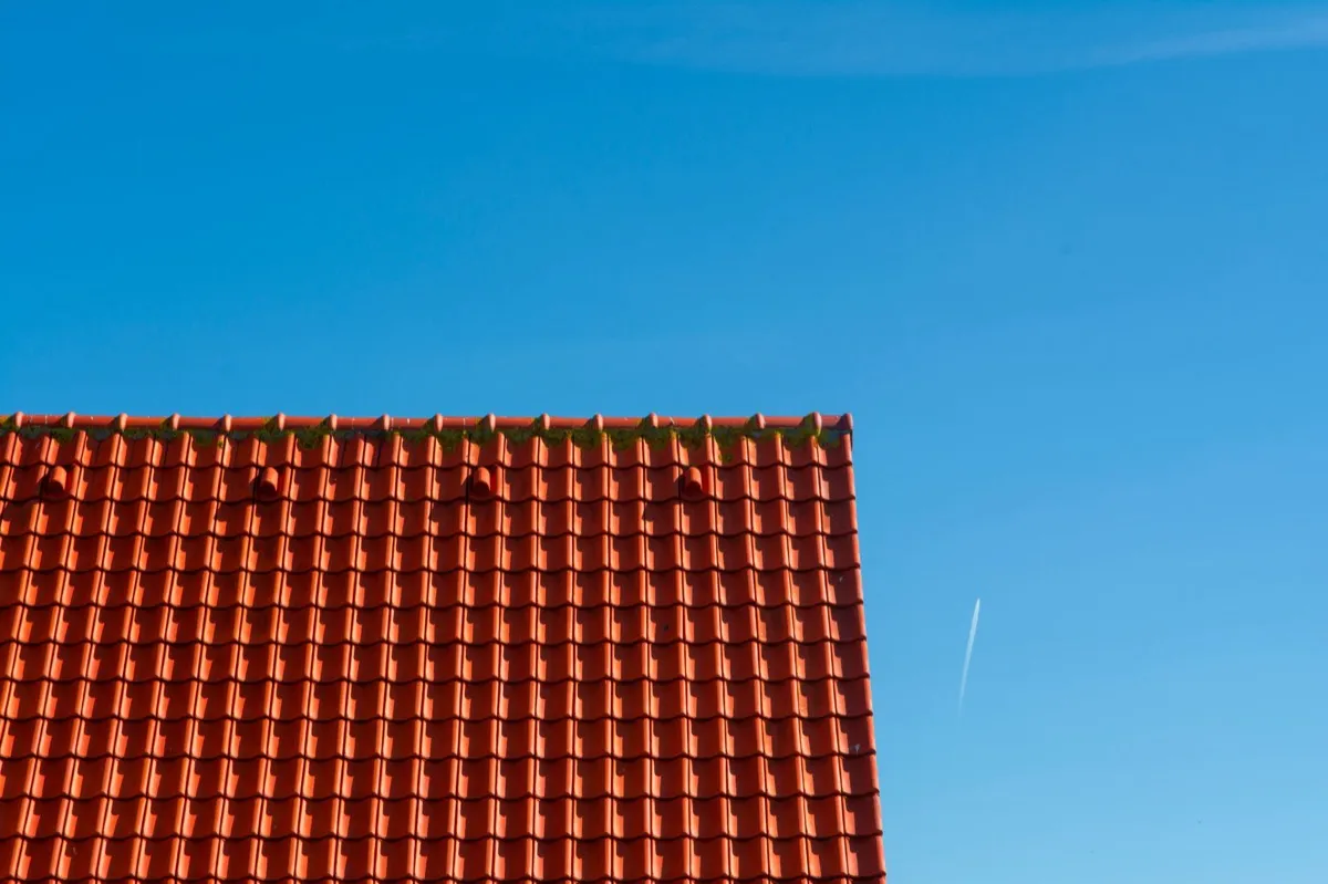 Tile roof gable in full sun, the kind of exposure that sets roof life in Tallahassee, FL